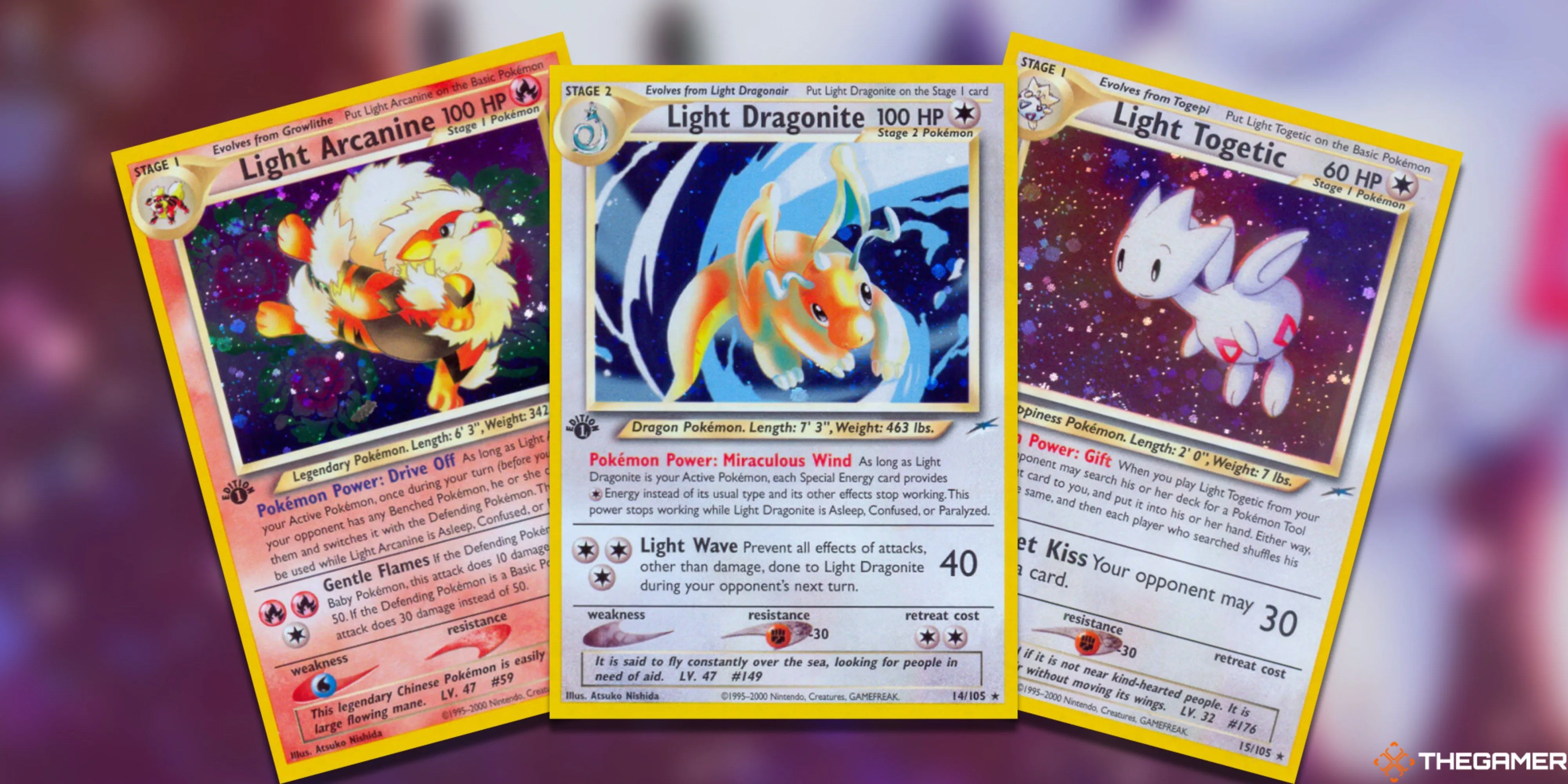 Ba thẻ bài Pokemon TCG hệ Light gồm Arcanine, Dragonite và Togetic được xòe ra