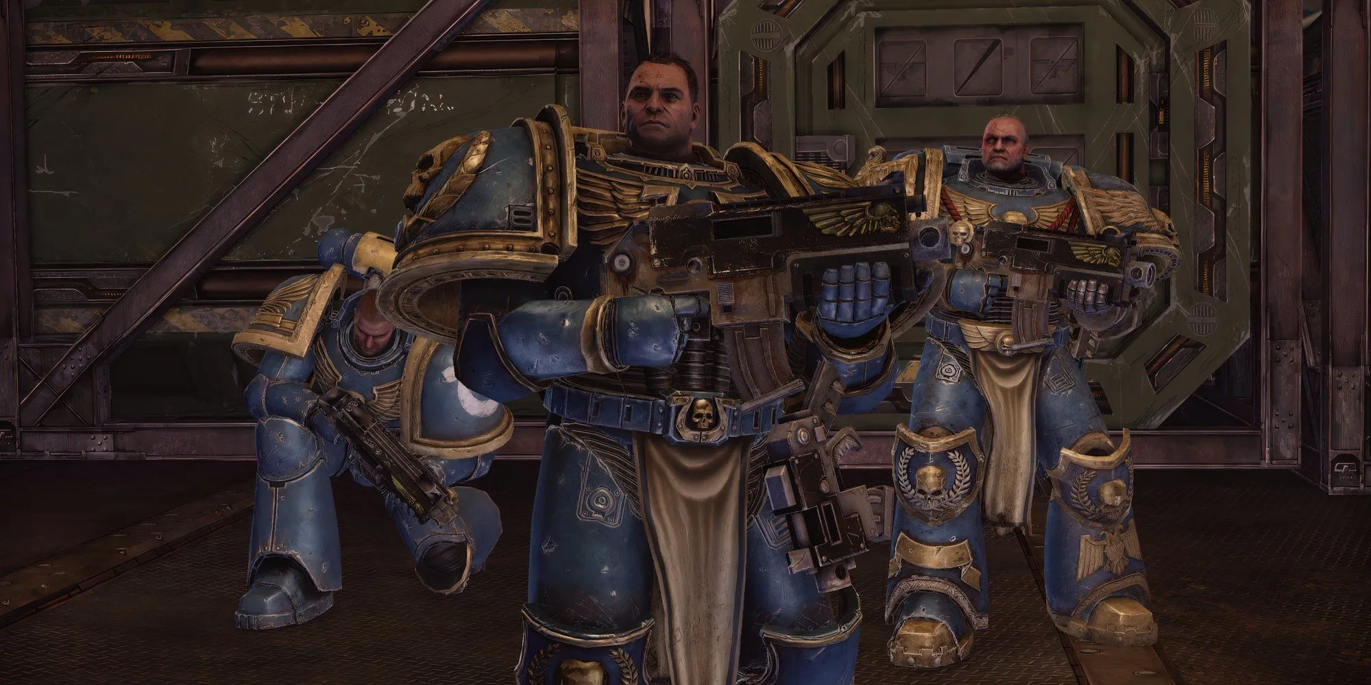 Captain Titus Ultramarines và đồng đội Sidonus cùng Leandros trong cắt cảnh của Warhammer 40,000: Space Marine - Master Crafted Edition, sẵn sàng cho nhiệm vụ