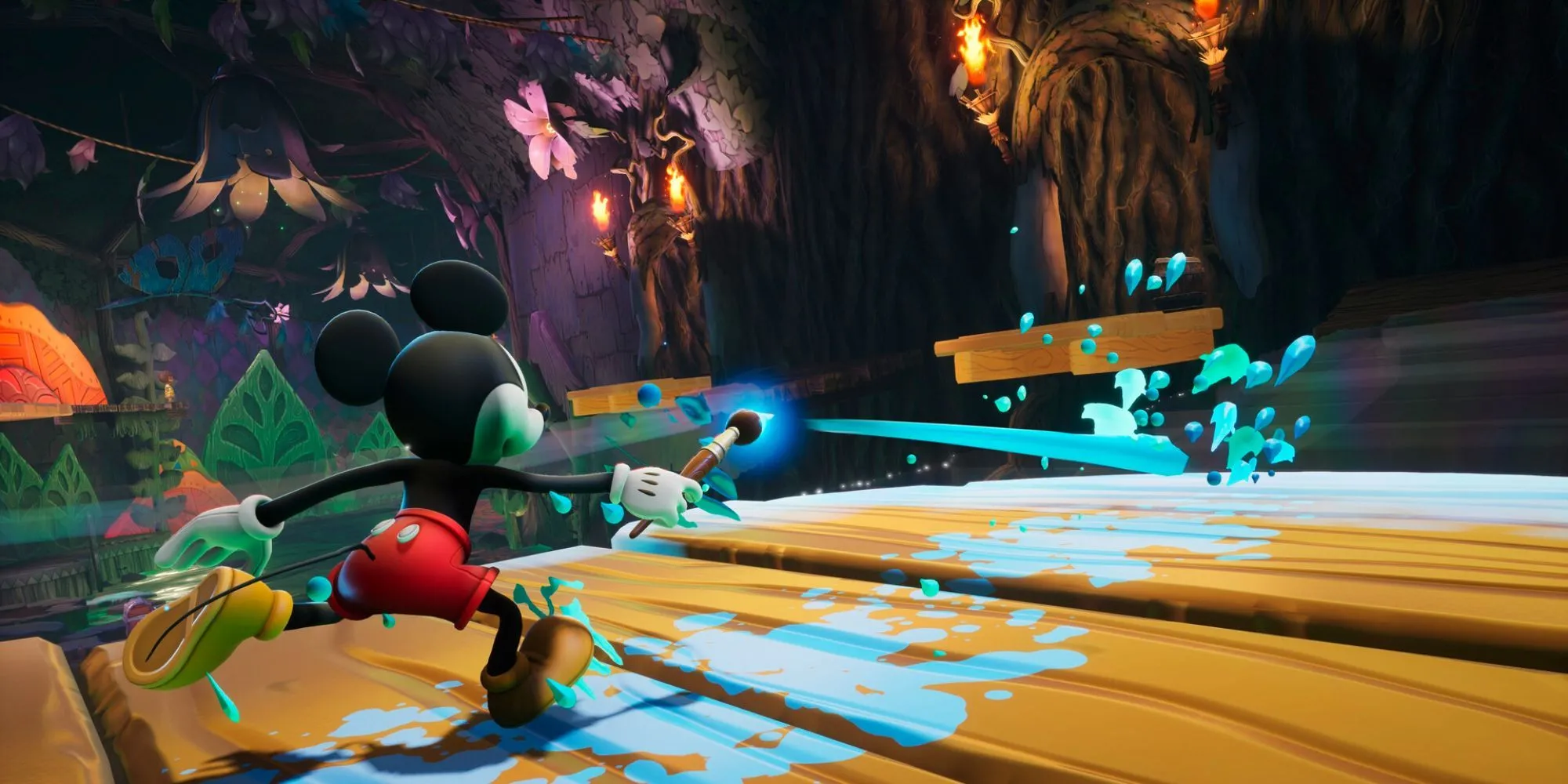 Mickey Chuột đang đứng trên một ngọn núi đá bị phong hóa trong thế giới Wasteland của game Epic Mickey, phía xa là một lâu đài đổ nát, thể hiện cơ chế nền tảng 3D độc đáo.