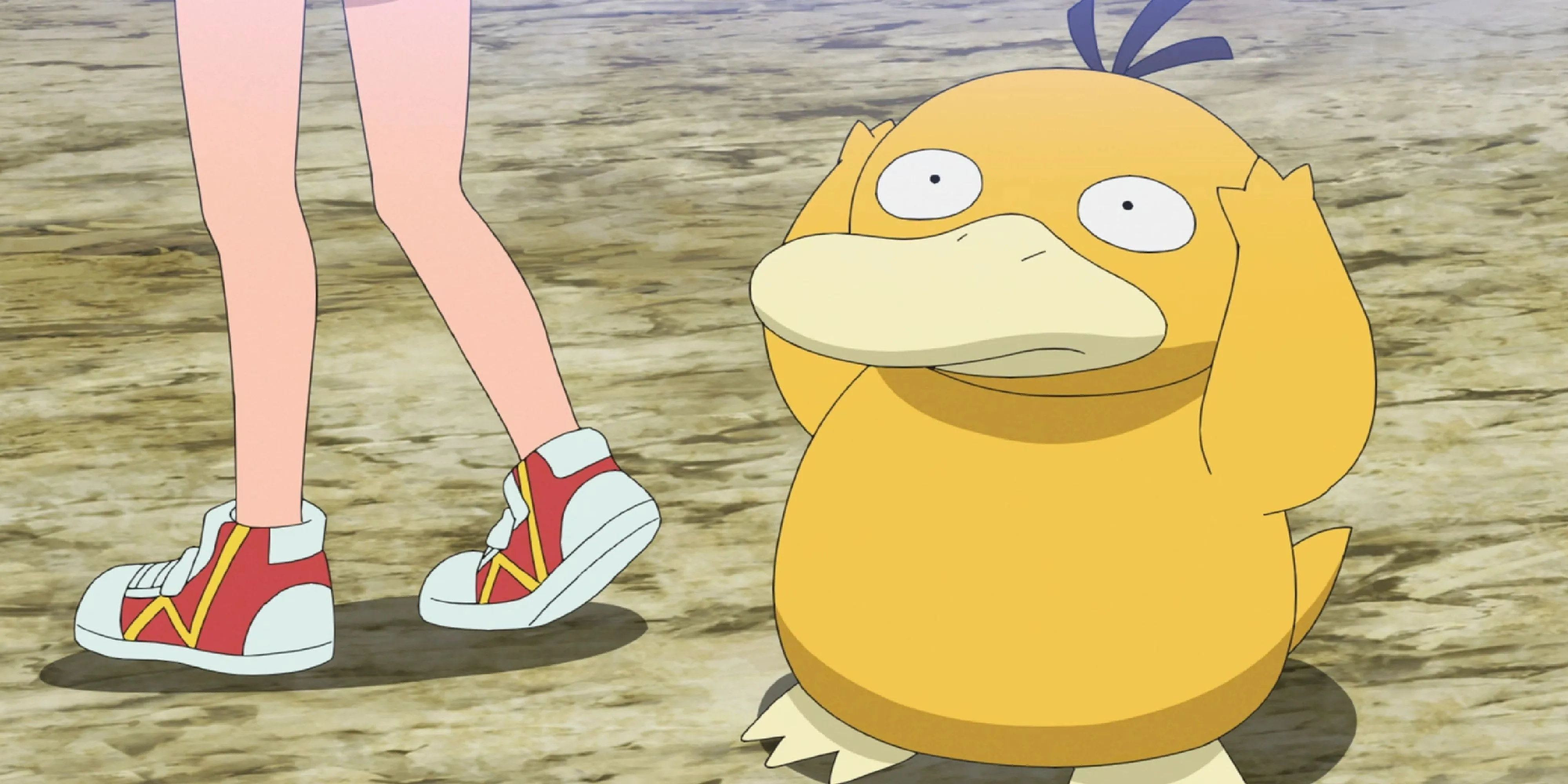 Psyduck ôm đầu với cả hai tay trong hoạt hình Pokemon
