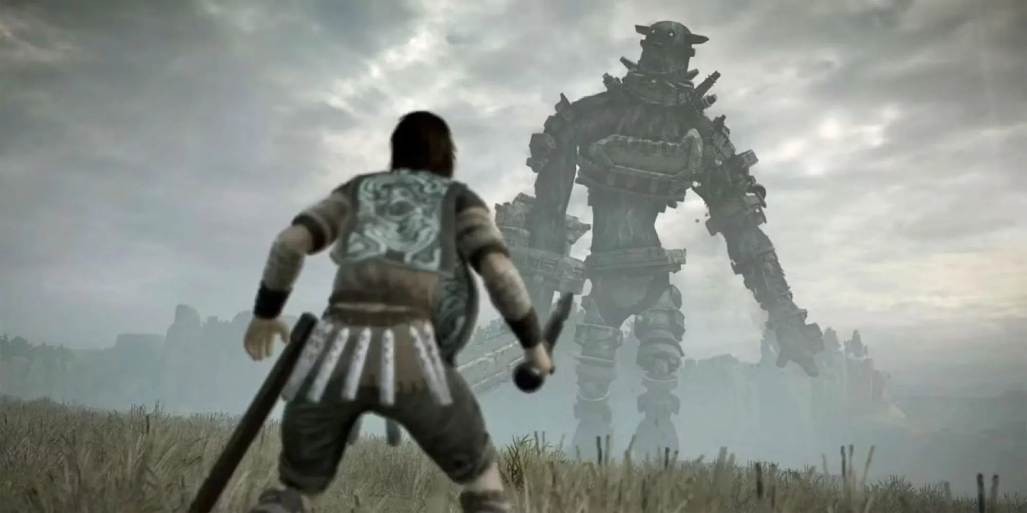Wander đứng trước một Colossus khổng lồ trong Shadow Of The Colossus