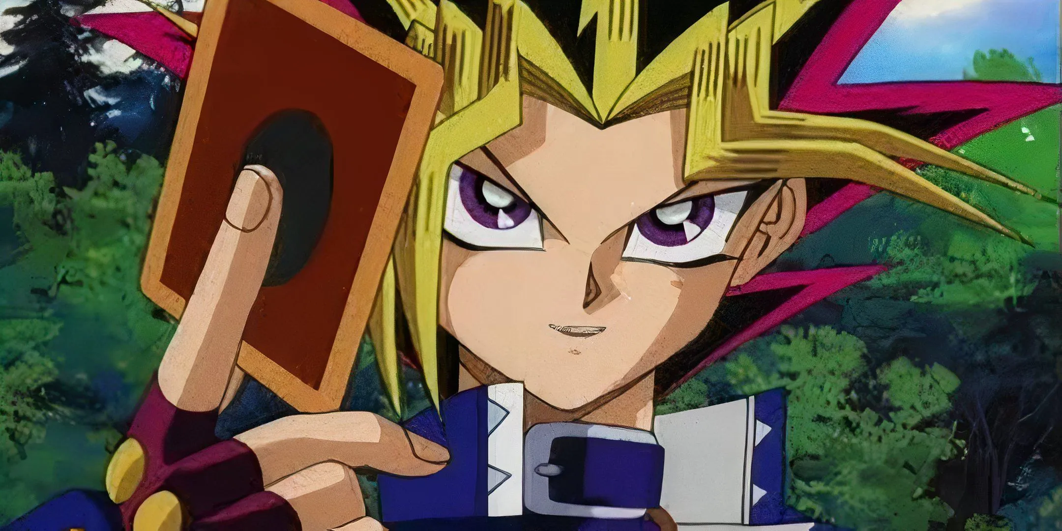 Yugi Muto giơ thẻ bài đầy tự mãn trong Yu-Gi-Oh! Duel Monsters