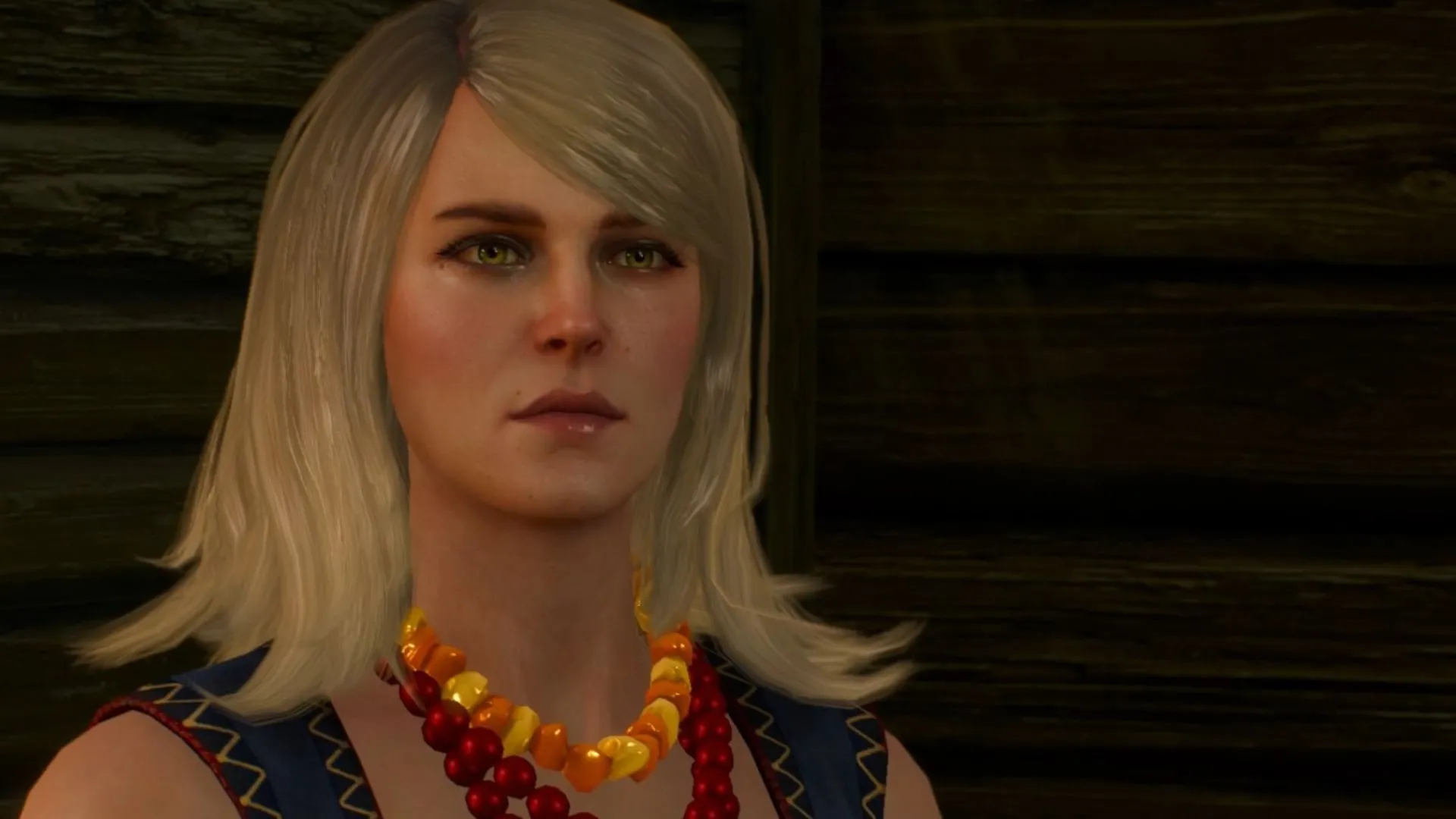 Cận cảnh phù thủy Keira Metz từ The Witcher 3: Wild Hunt, với nụ cười tự mãn và mái tóc vàng óng, tôn lên cá tính độc lập.