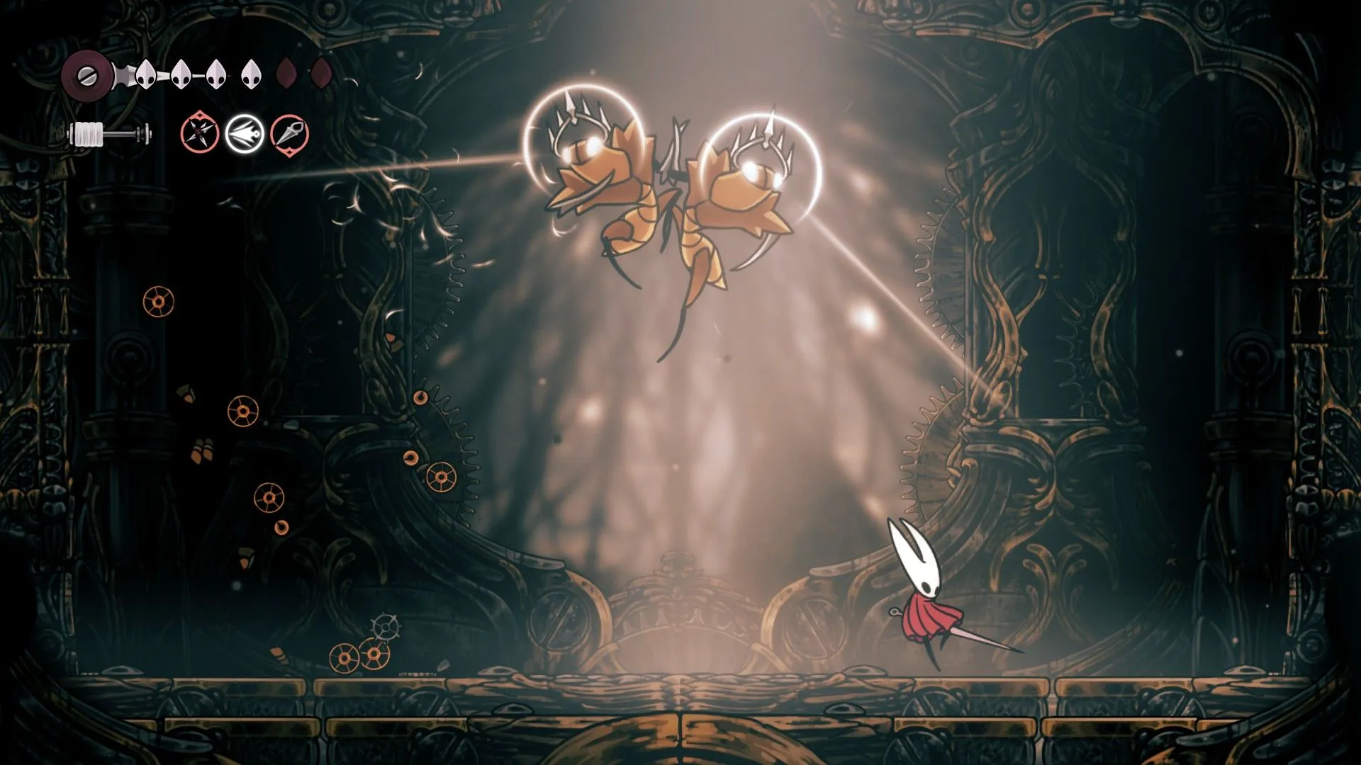 Cogwork Dancers với đòn tấn công chính giữa màn hình trong Hollow Knight Silksong