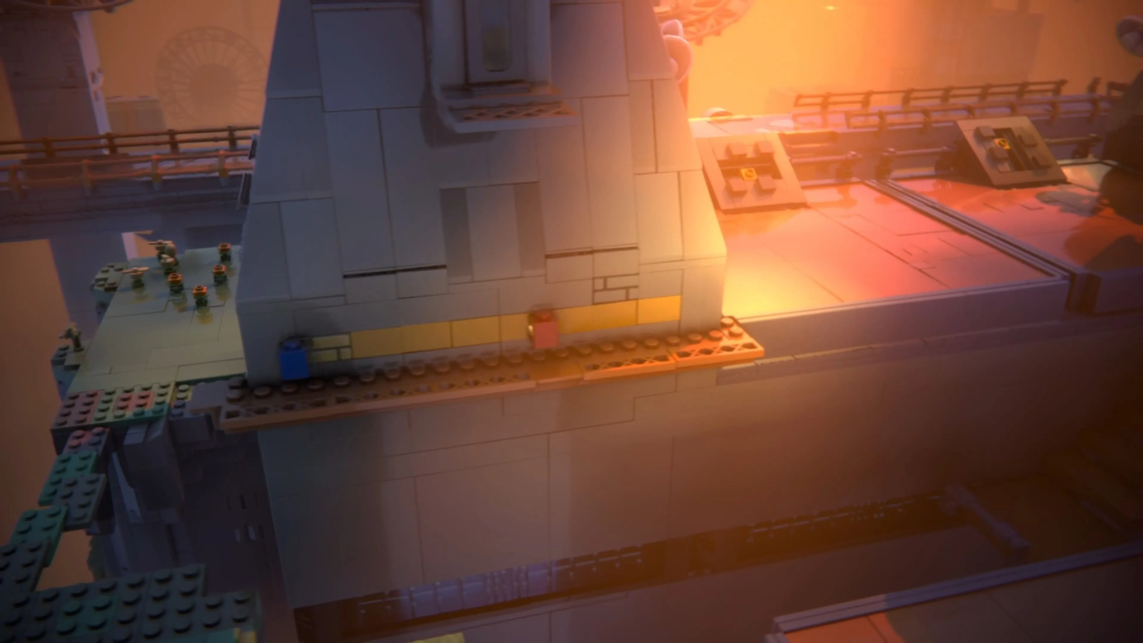 Hai nhân vật LEGO Red và Blue đứng trên con đường vừa được tạo ra sau khi làm đổ cầu.