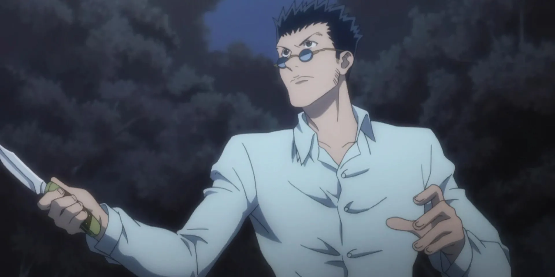 Leorio Paradinight trong bộ vest, biểu tượng của sự kiên định và mong muốn giúp đỡ trong Hunter x Hunter.