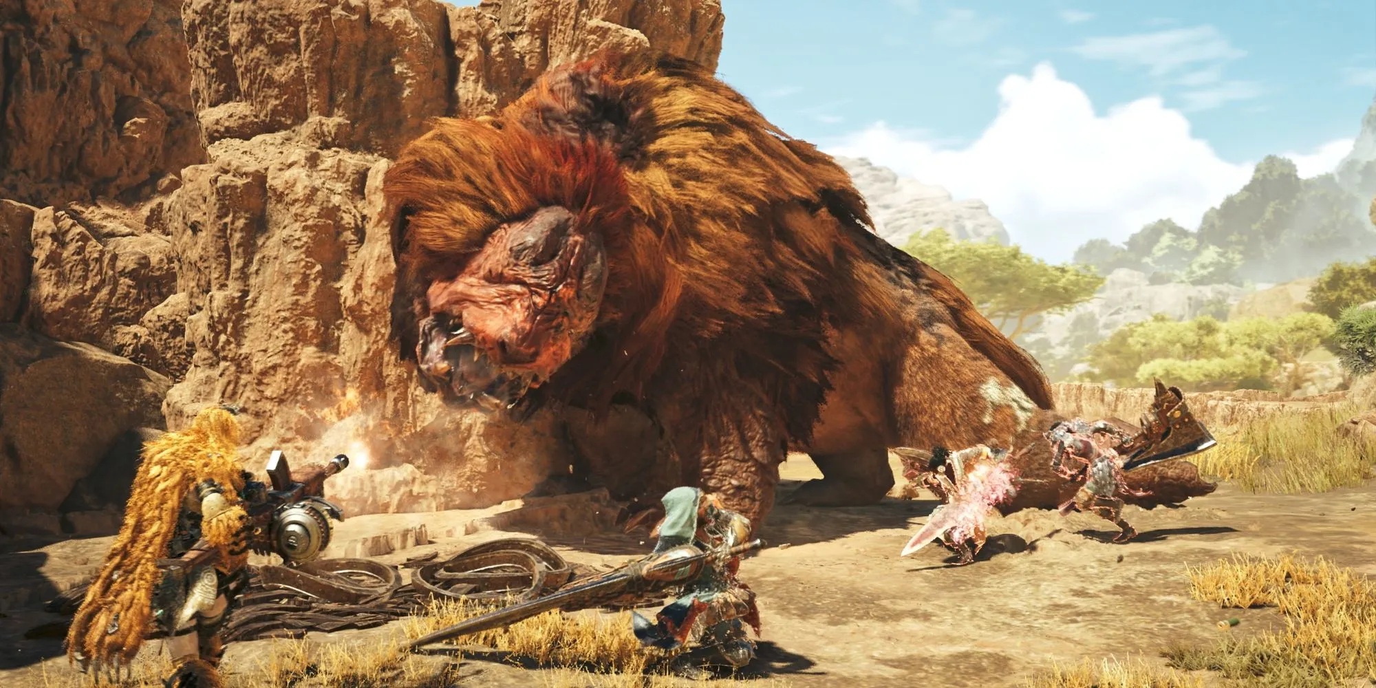 Một thợ săn cưỡi quái vật trong cảnh quan rộng lớn của Monster Hunter Wilds