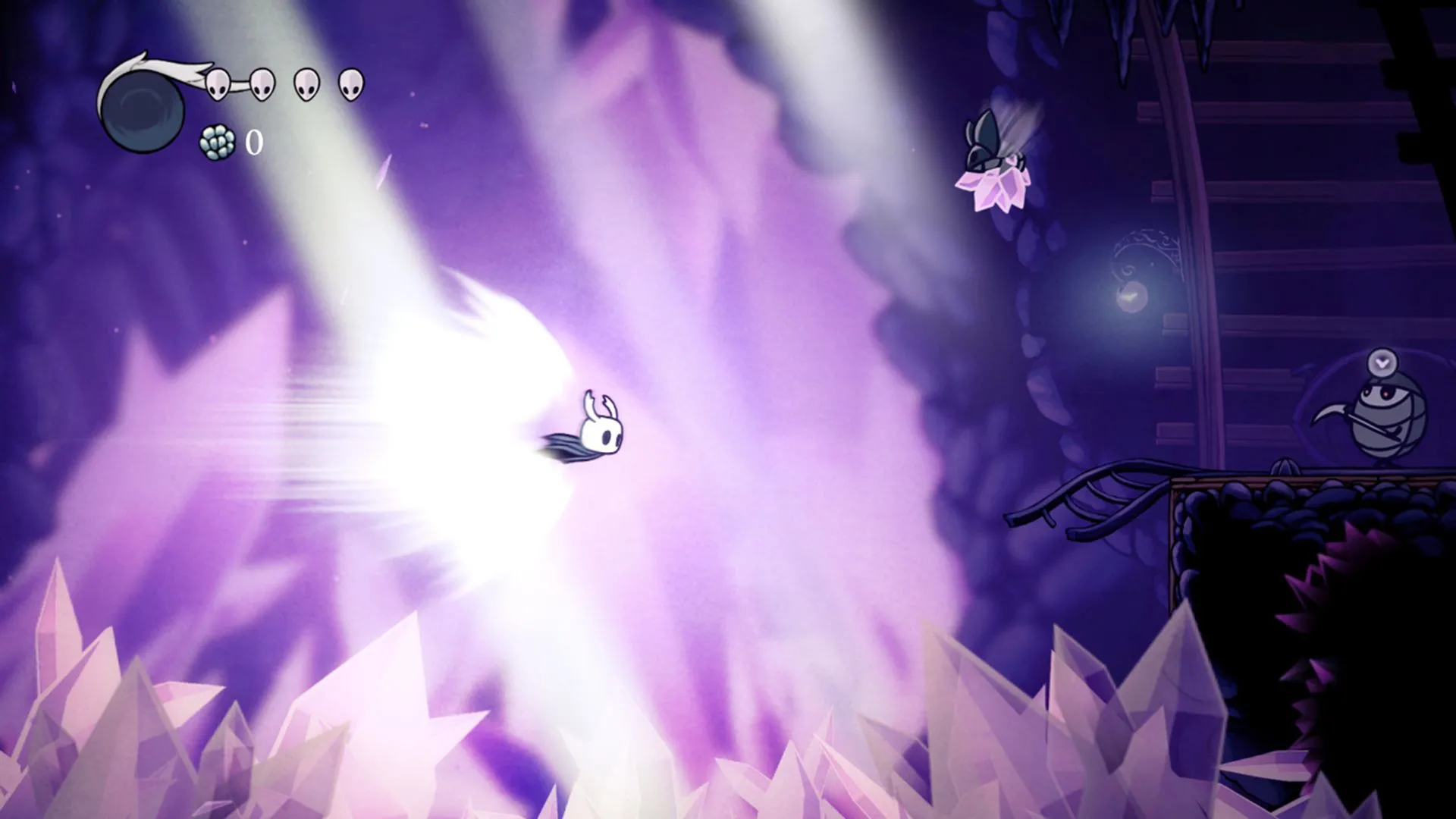 Nhân vật The Knight thực hiện động tác lướt (dash) trong Hollow Knight, thể hiện sự linh hoạt trong chiến đấu và khám phá